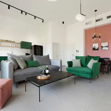 דירת גן שהפכה לדירת אירוח צבעונית 18